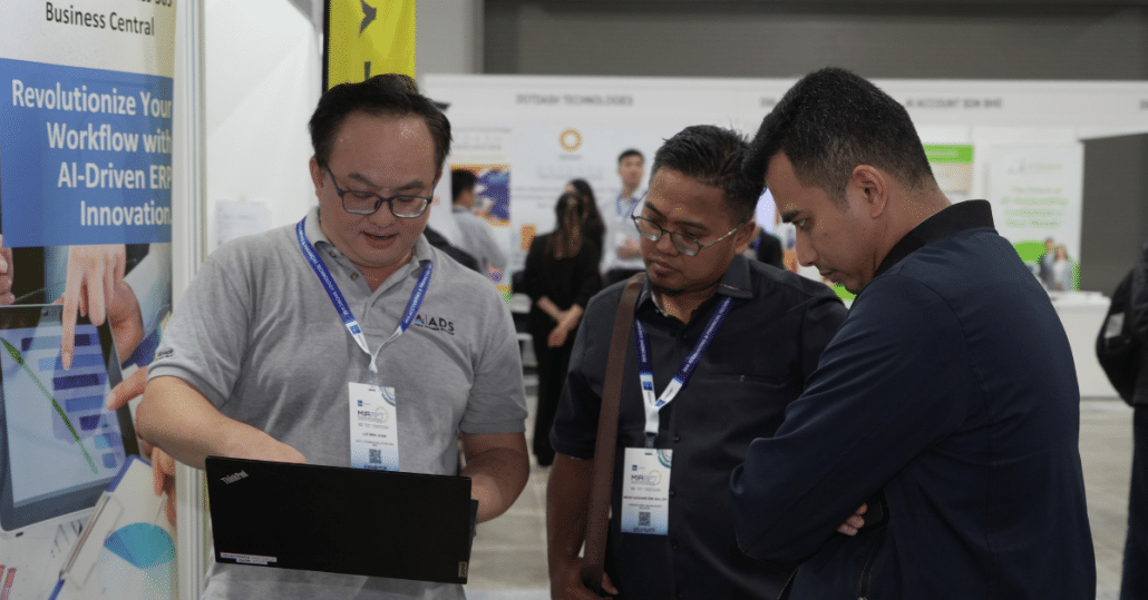 ADS Staff Discussed with Booth Visitors During MIA Event
