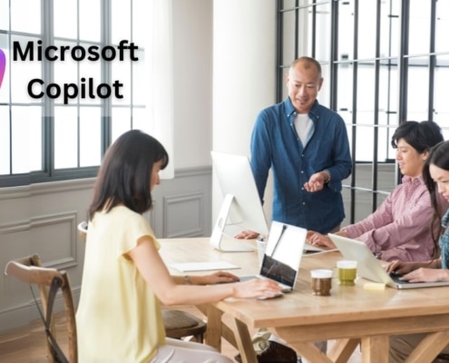 Office workers using Microsoft Copilot applications